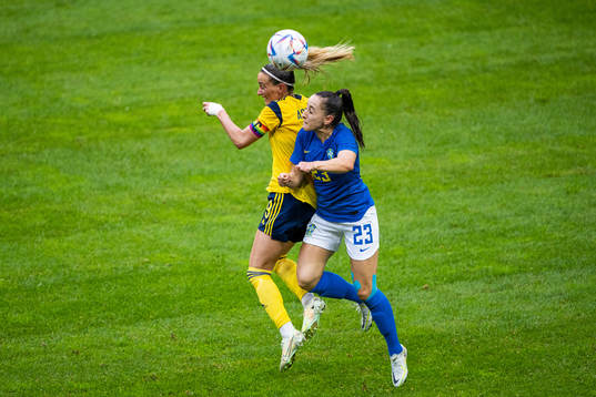 Kosovare Asllani of Sweden and Luana of Brazil