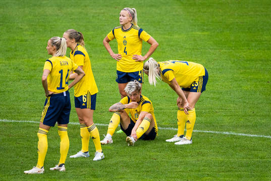 Lina Hurtig of Sweden in pain sitting down