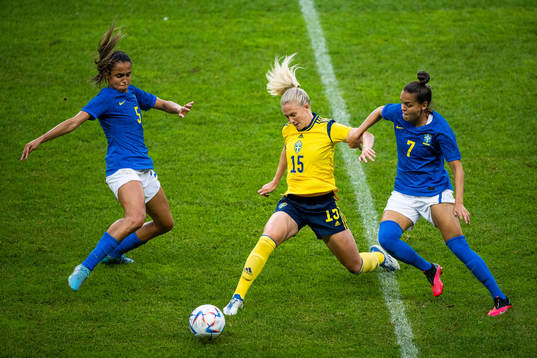 Rebecka Blomqvist of Sweden competes for the ball with Duda