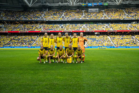 Players of Sweden pose for a photo