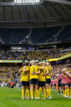 Caroline Seger and Magdalena Eriksson of Sweden celebrate