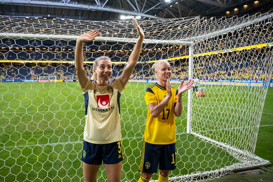 Linda Sembrant and Caroline Seger of Sweden celebrate