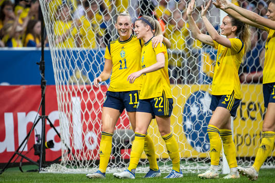 Stina Blackstenius and Olivia Schough of Sweden celebrate