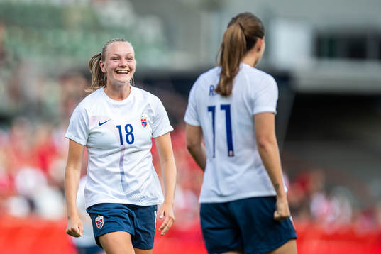 Frida Maanum of Norway celebrates 1-1 by Guro Reiten (back