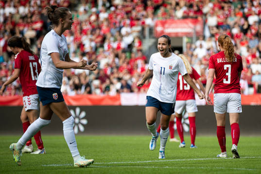 Guro Reiten of Norway celebrate