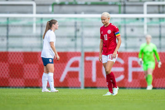 Pernille Harder of Denmark looks dejected