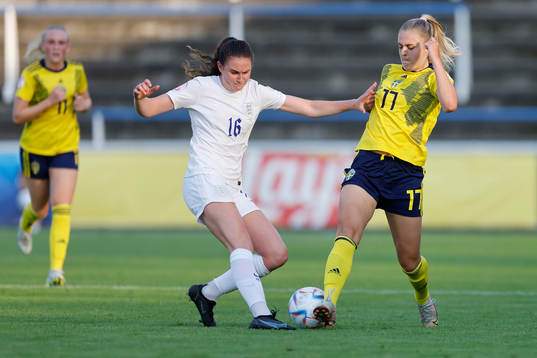 Lisa Björk of Sweden in action against Caitlin Smith of
