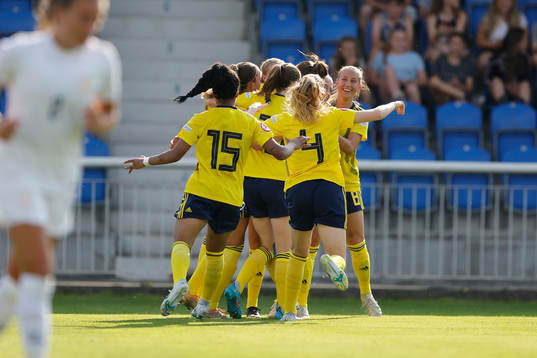 Players of Sweden celebrate