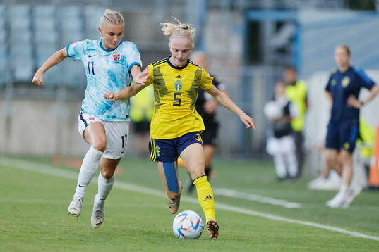 Anna Sandberg  of Sweden in action against Thea Kyvåg of