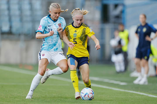 Anna Sandberg  of Sweden in action against Thea Kyvåg of