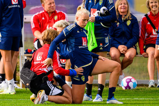 Stina Blackstenius gets treated by physio Annica Näsmark