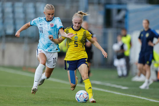 Anna Sandberg  of Sweden in action against Thea Kyvåg of