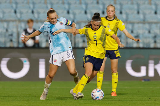Emilia Pelgander  of Sweden in action against Julie Jorde