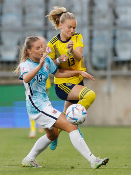 Matilda Vinberg  of Sweden in action against Maria Fink of