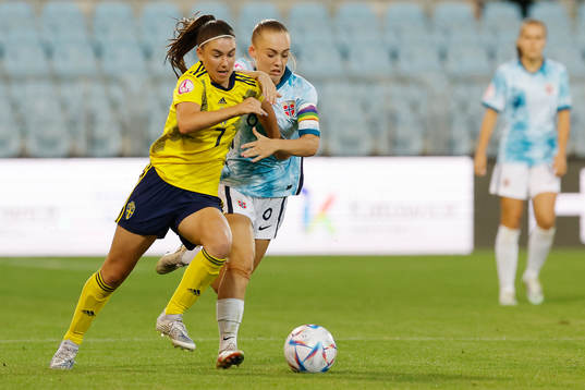 Emilia Pelgander of Sweden in action against Julie Jorde of