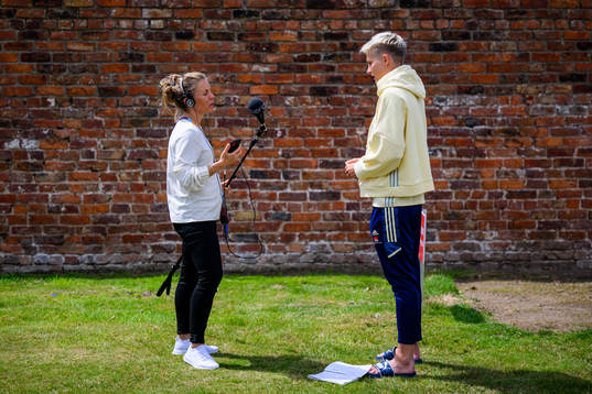 Lina Hurtig is interviewed by the media