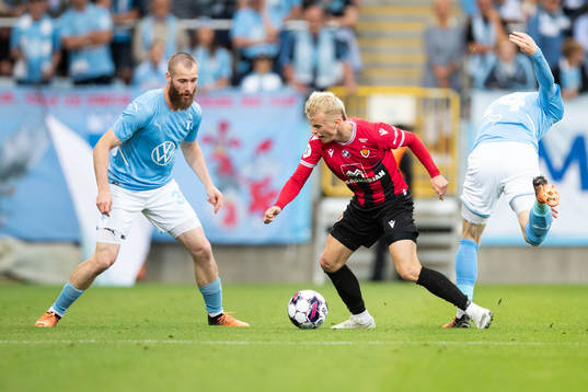 Jo Inge Berget and Lasse Nielsen of Malmö FF and Kristall