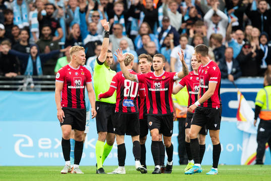 Kristall Mani Ingason of Vikingur receives a red card from