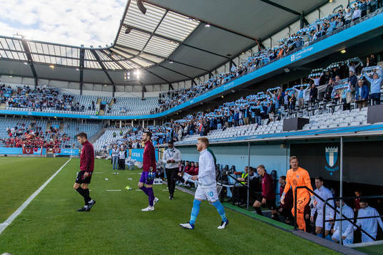 Anders Christiansen and goalkeeper Johan Dahlin of Malmö FF