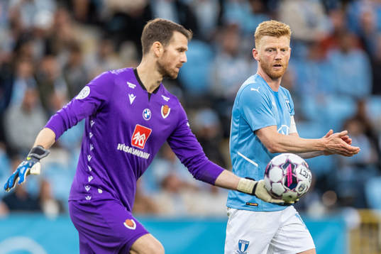 Goalkeeper Thordur Ingason of Vikingur and Anders