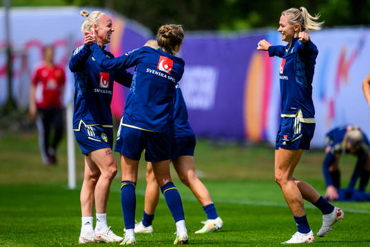 Caroline Seger and Fridolina Rolfö celebrate