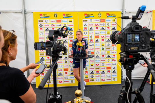 Olivia Schough is interviewed by the media