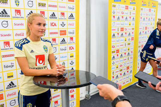 Amanda Nilden is interviewed by the media