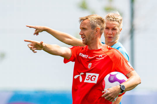 Martin Sjögren, head coach, and Ada Hegerberg of the