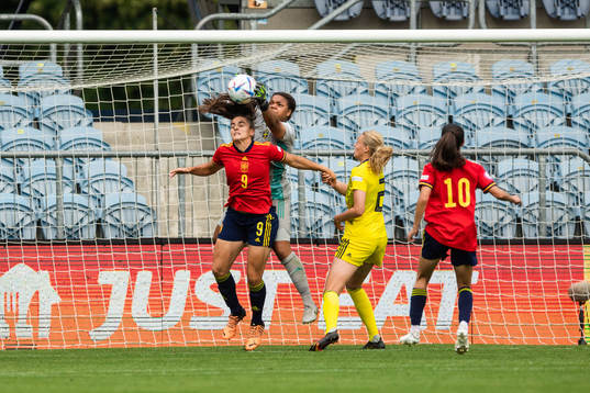 Carmen Alvarez Sanchez of Spain and goalkeeper Serina