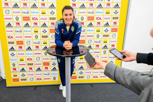 Goalkeeper Zecira Musovic is interviewed by the media