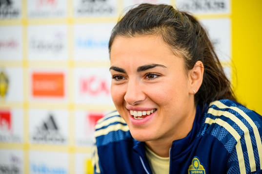 Goalkeeper Zecira Musovic is interviewed by the media