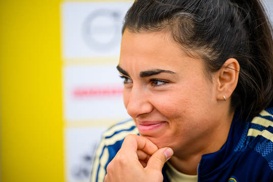 Goalkeeper Zecira Musovic is interviewed by the media