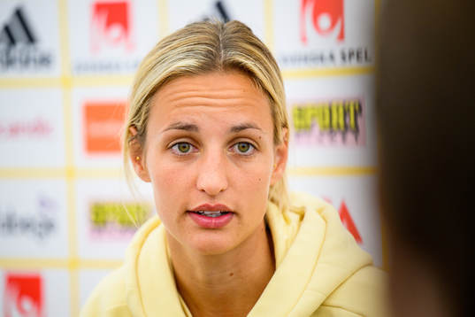 Nathalie Björn is interviewed by the media