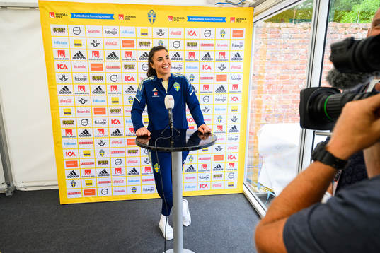 Goalkeeper Zecira Musovic is interviewed by the media