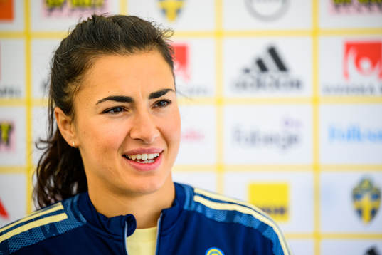 Goalkeeper Zecira Musovic is interviewed by the media