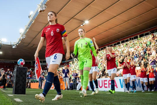 Maren Mjelde and goalkeeper Guro Pettersen of Norway