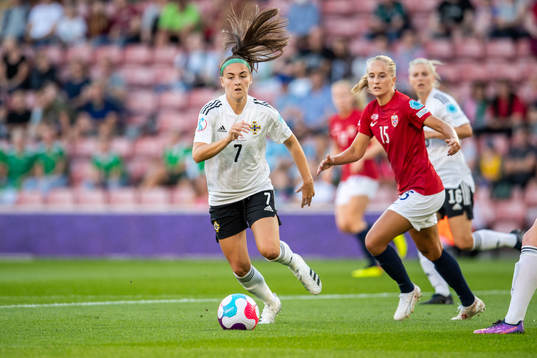 Chloe McCarron of Northern Ireland and Amalie Eikeland of