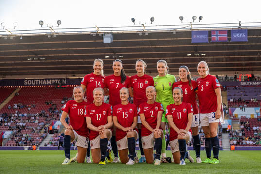 The starting eleven of Norway pose for a team photo