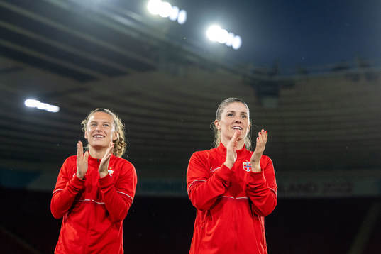 Synne Skinnes Hansen and Maren Mjelde of Norway celebrate