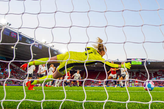 Goalkeeper Jacqueline Burns of Northern Ireland lets in the
