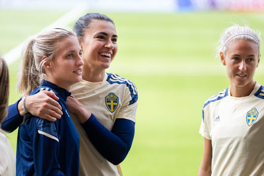 Nathalie Björn and goalkeeper Zecira Musovic of Sweden