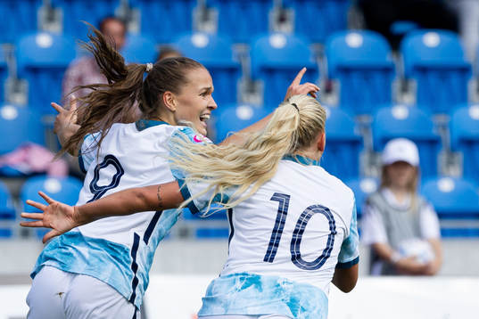 Iris Omarsdottir and Cathinka Tandberg of Norway celebrate