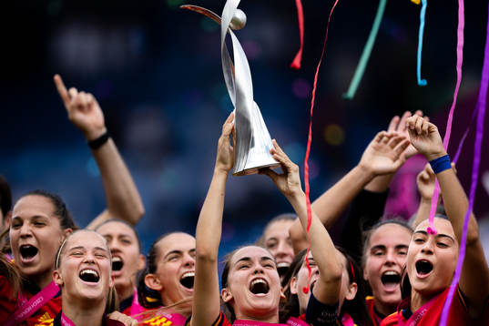 Players of Spain celebrate with the trophy