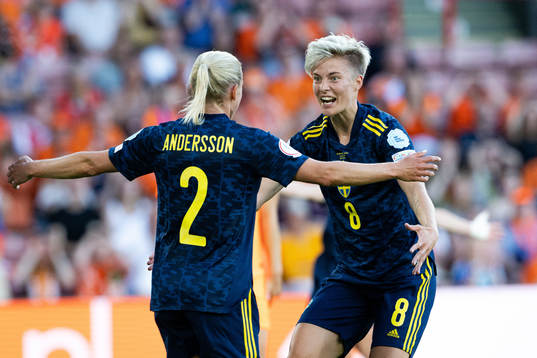 Jonna Andersson and Lina Hurtig of Sweden celebrate the 0-1
