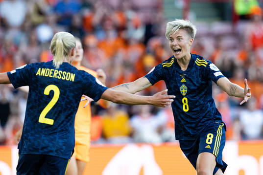 Jonna Andersson and Lina Hurtig of Sweden celebrate the 0-1