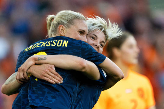 Jonna Andersson and Lina Hurtig of Sweden celebrate the 0-1