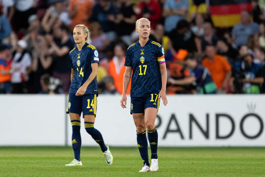 Nathalie Björn and Caroline Seger of Sweden look dejected