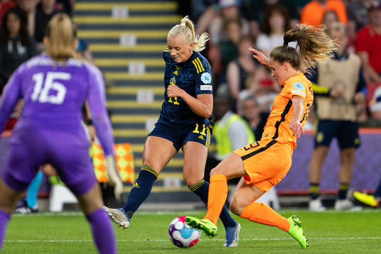 Stina Blackstenius of Sweden and Marisa Olislagers of