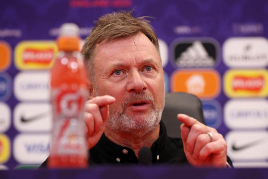 In this handout photo from UEFA head coach Peter