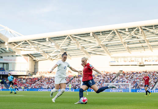 Lucy Bronze of England and Karina Sævik +of Norway